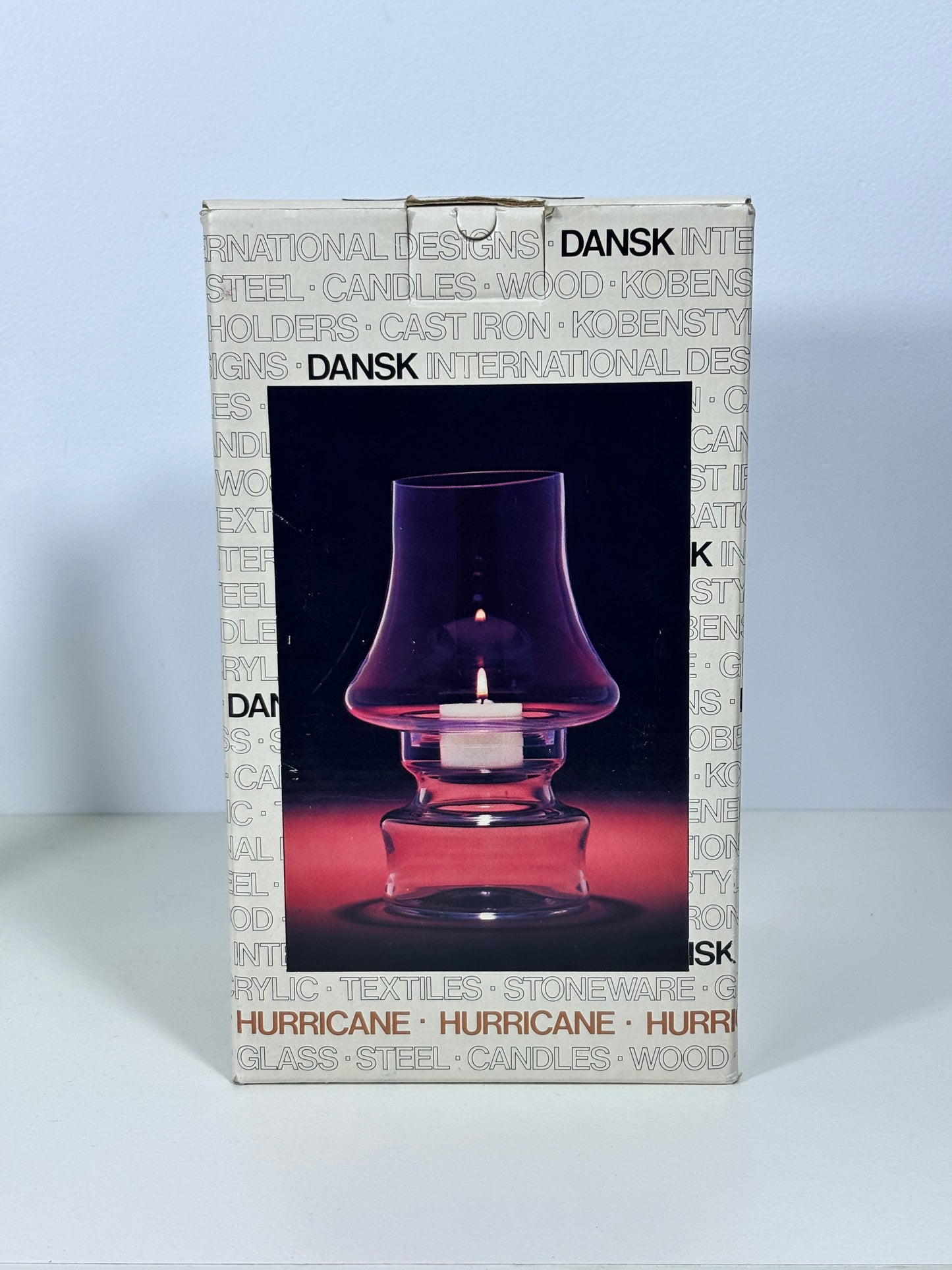 Dansk Hurricane hurricane lamp packaging on a light blue background