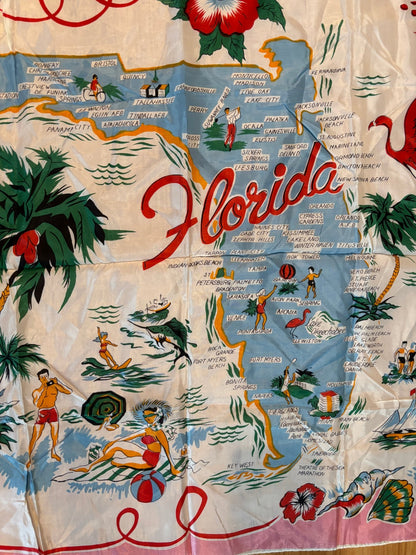 pink Florida Souvenir Scarf with images of Florida, beaches, landmarks, trees and birds.