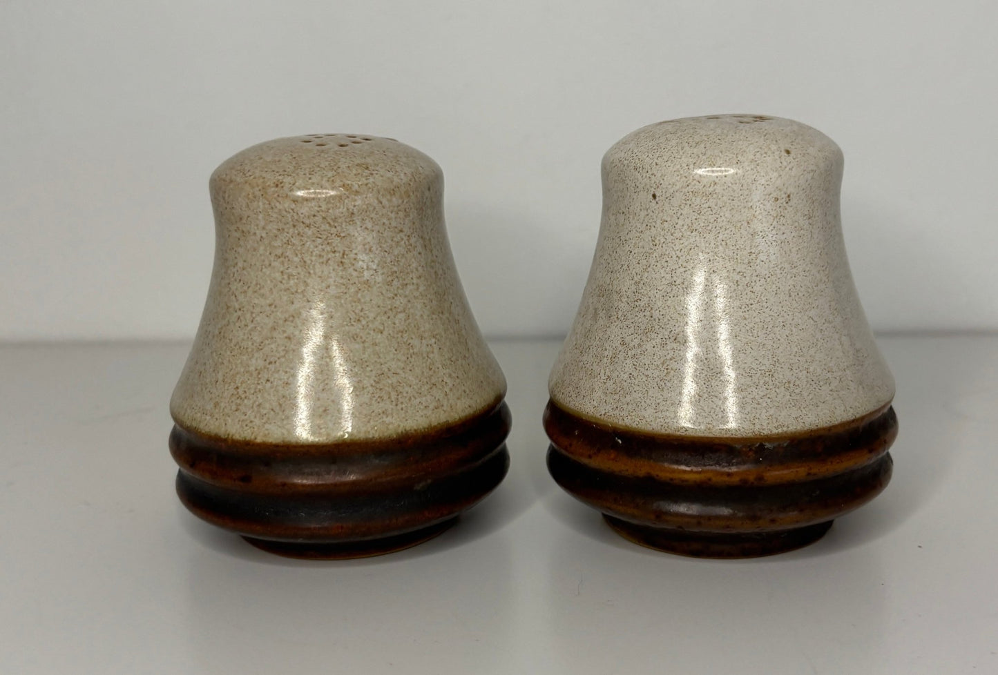 Denby Potters Wheel Salt and Pepper Shakers with brown and beige speckled finish