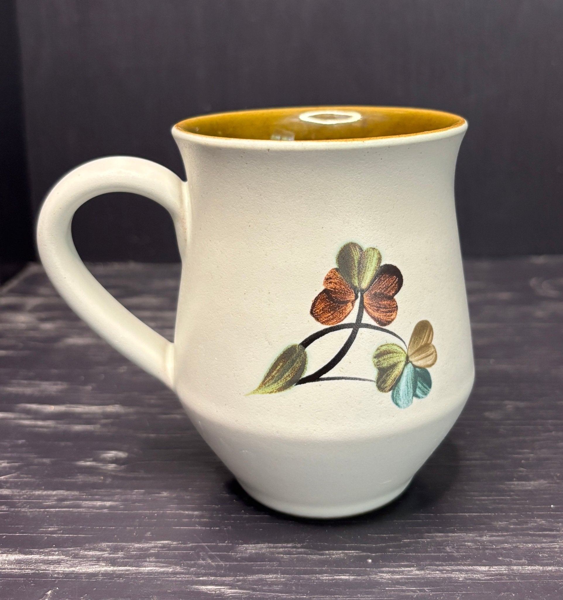 Denby Shamrock Coffee Mug with flower design and brown interior