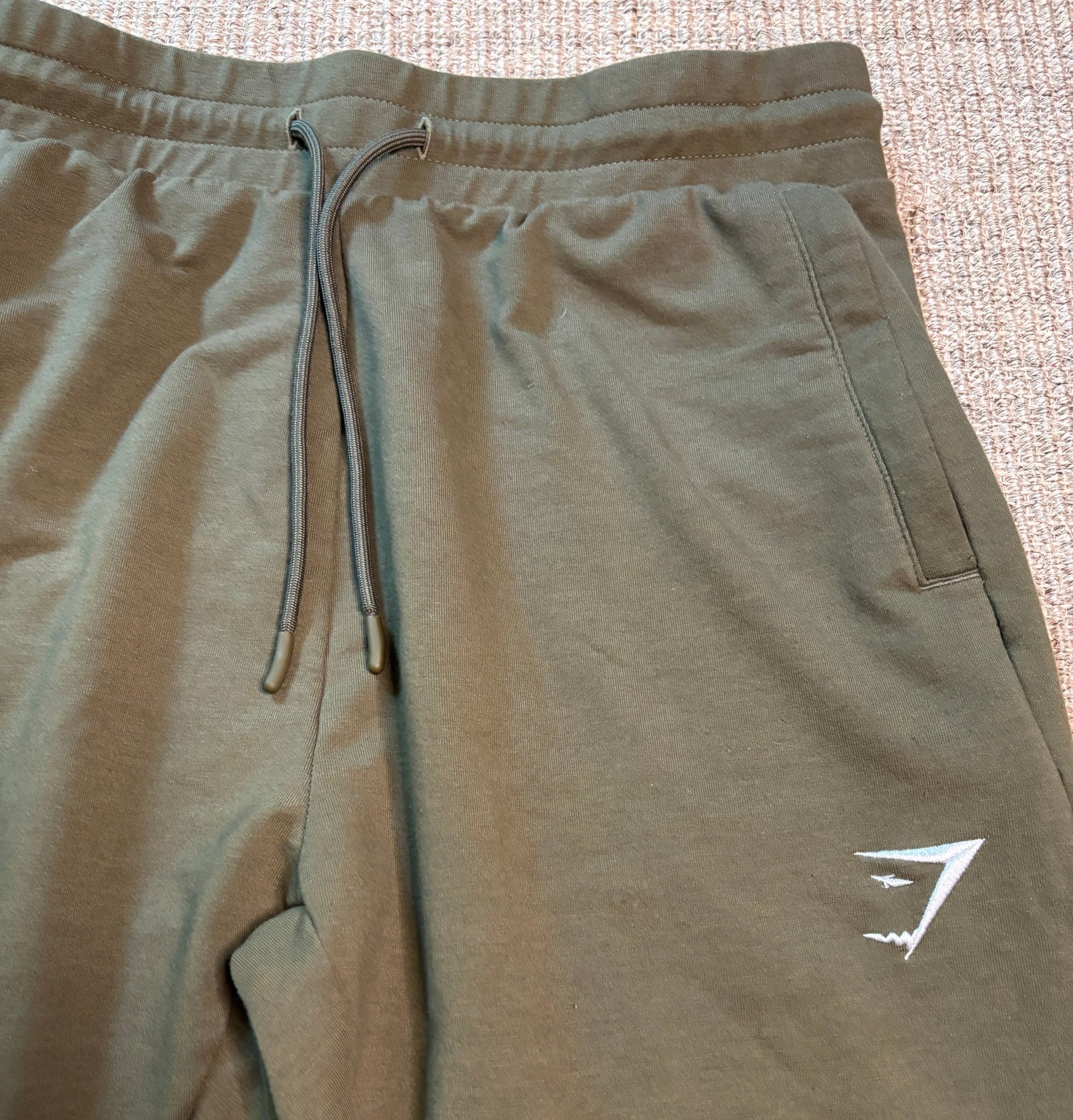 green Gymshark Arrival Woven Zippered Pocket Joggers