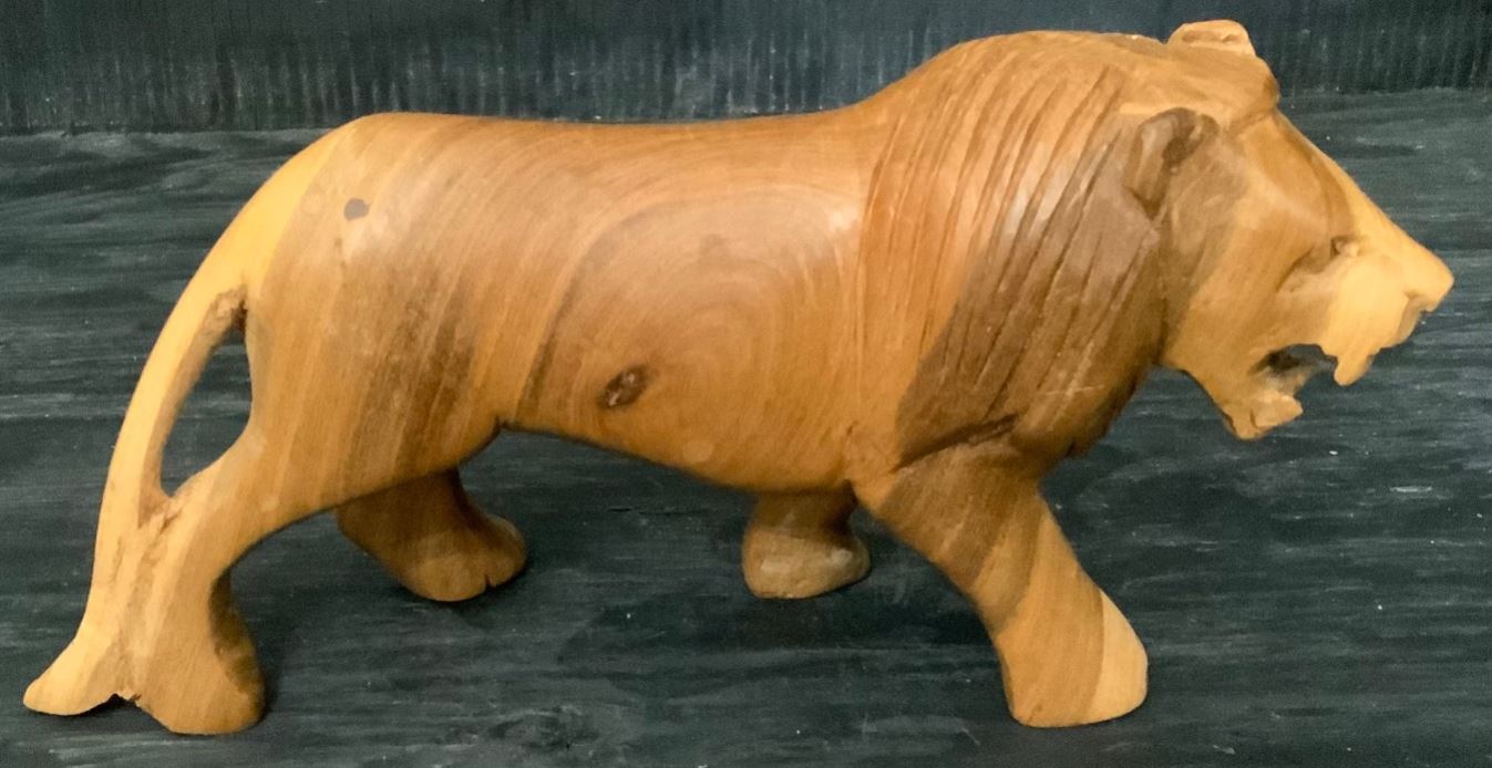 Hand Carved Wood Rhinoceros and Lion figurines