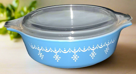 blue pyrex casserole dish with snowflake pattern