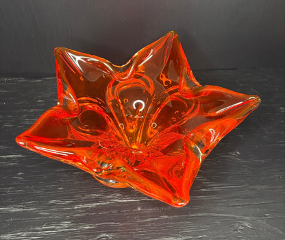 orange bowl shaped like a leaf