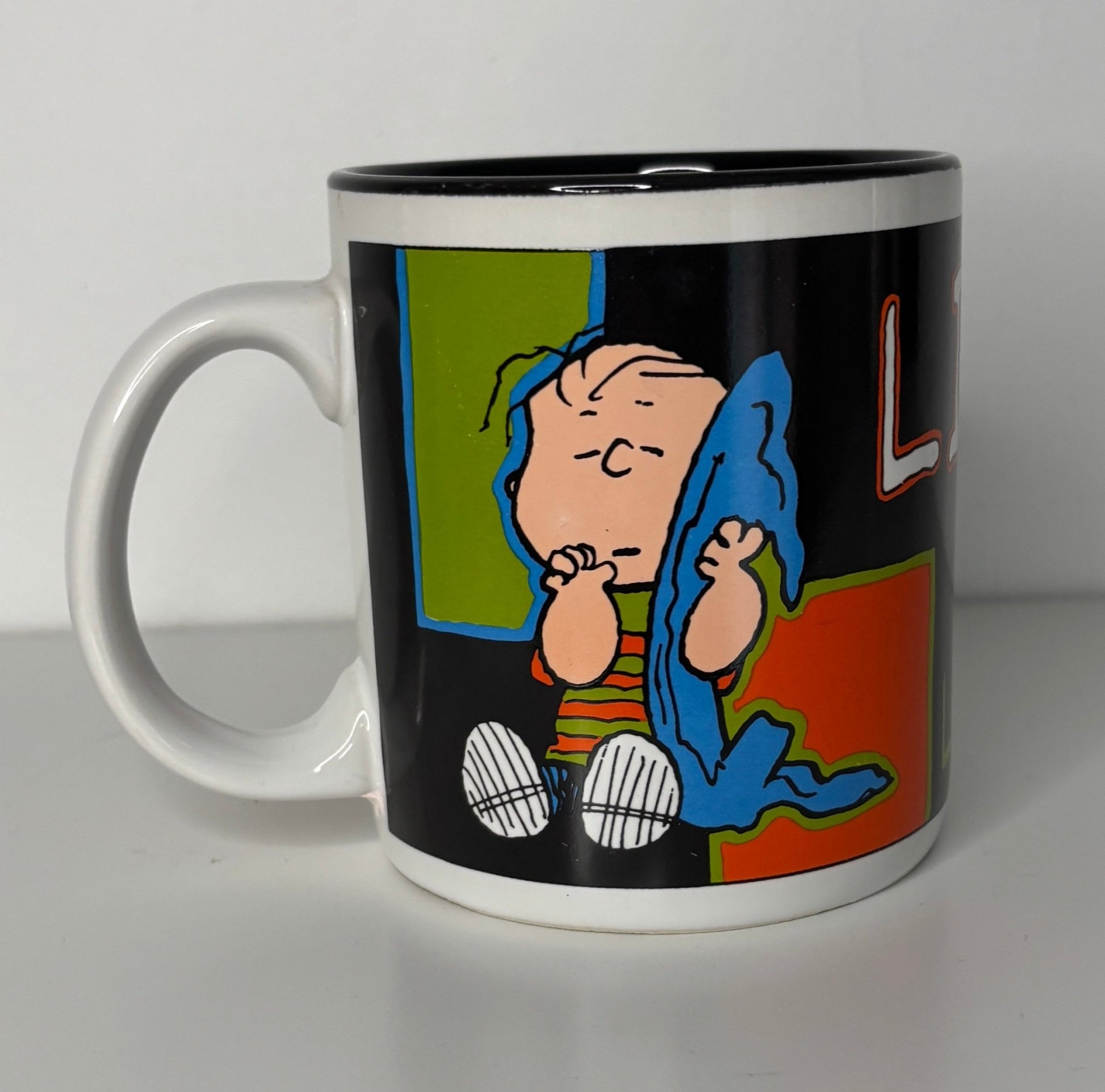 Peanuts Linus holding a Blanket Coffee Mug