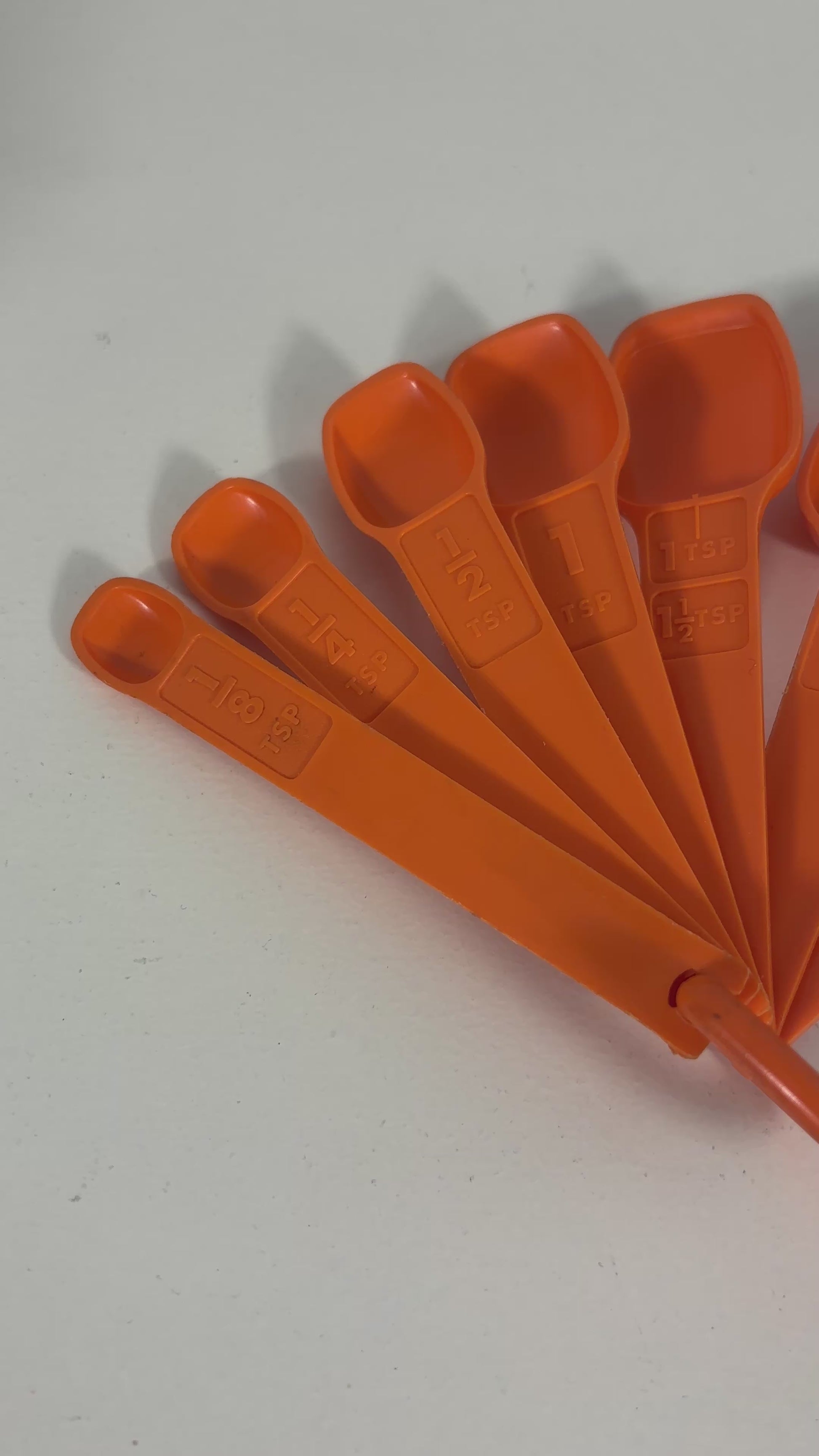 Set of Vintage Orange Tupperware Measuring Spoons