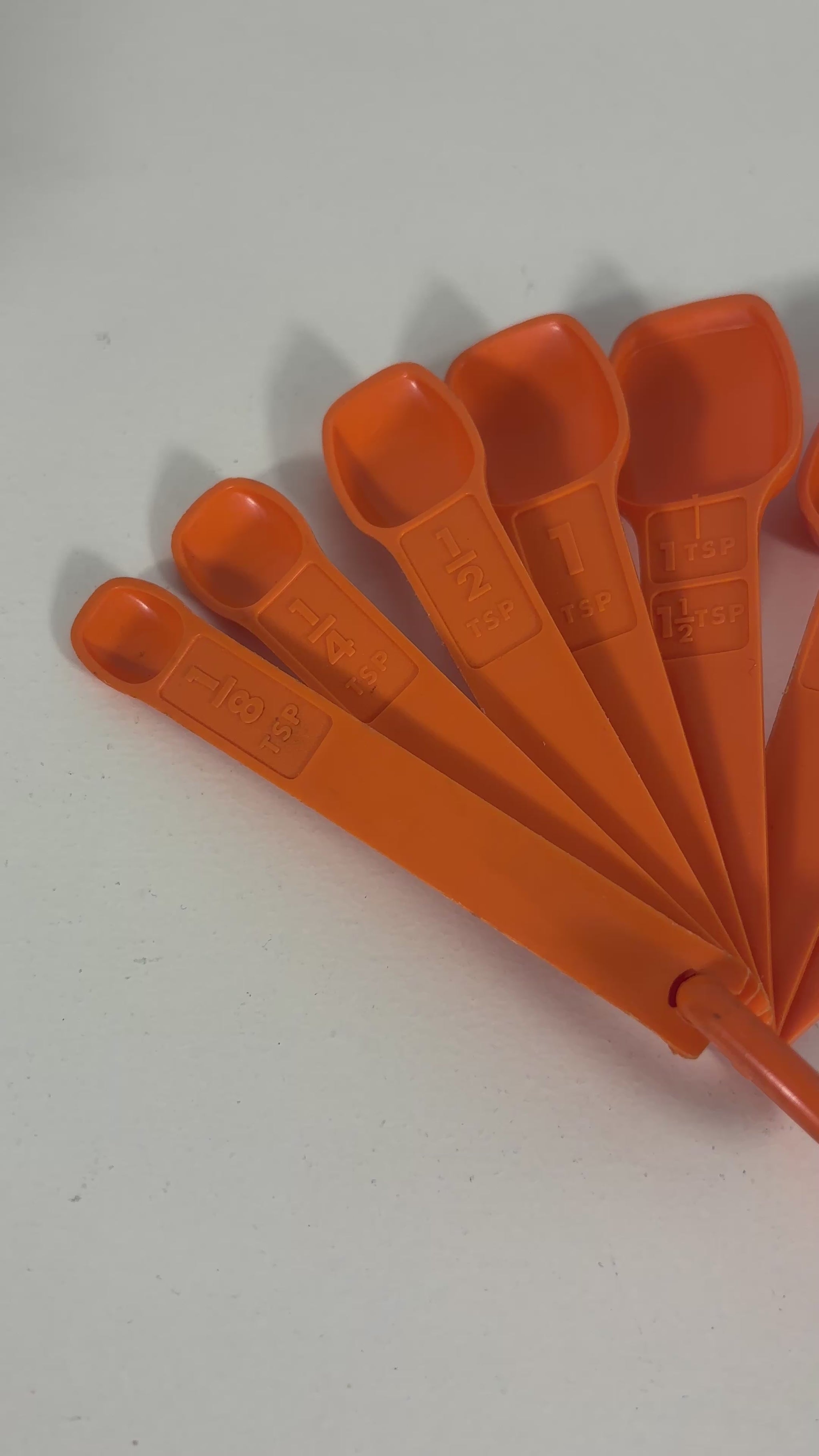 Set of Vintage Orange Tupperware Measuring Spoons