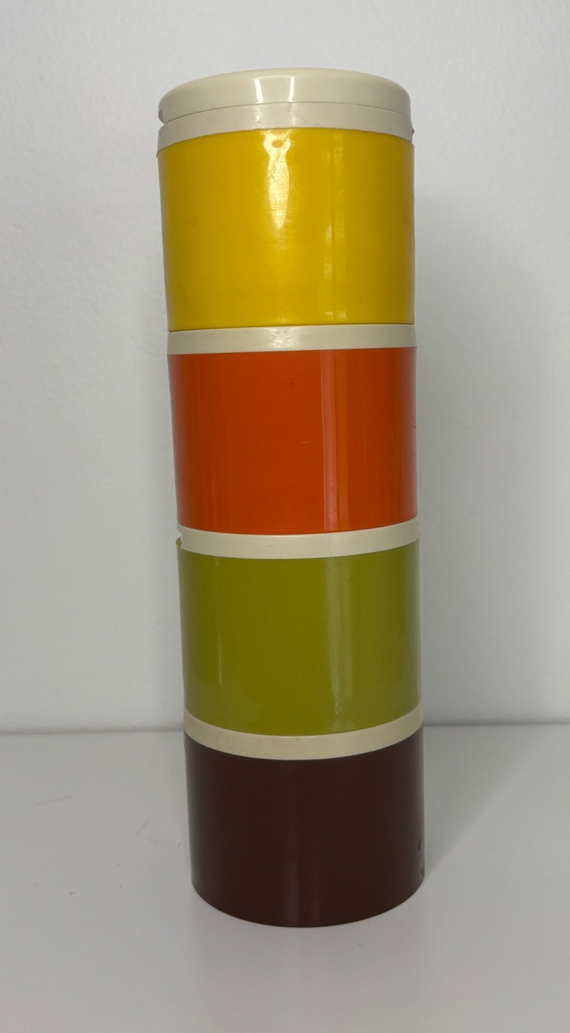 Stackable Tupperware Spice Shakers Containers in yellow, orange, brown and green