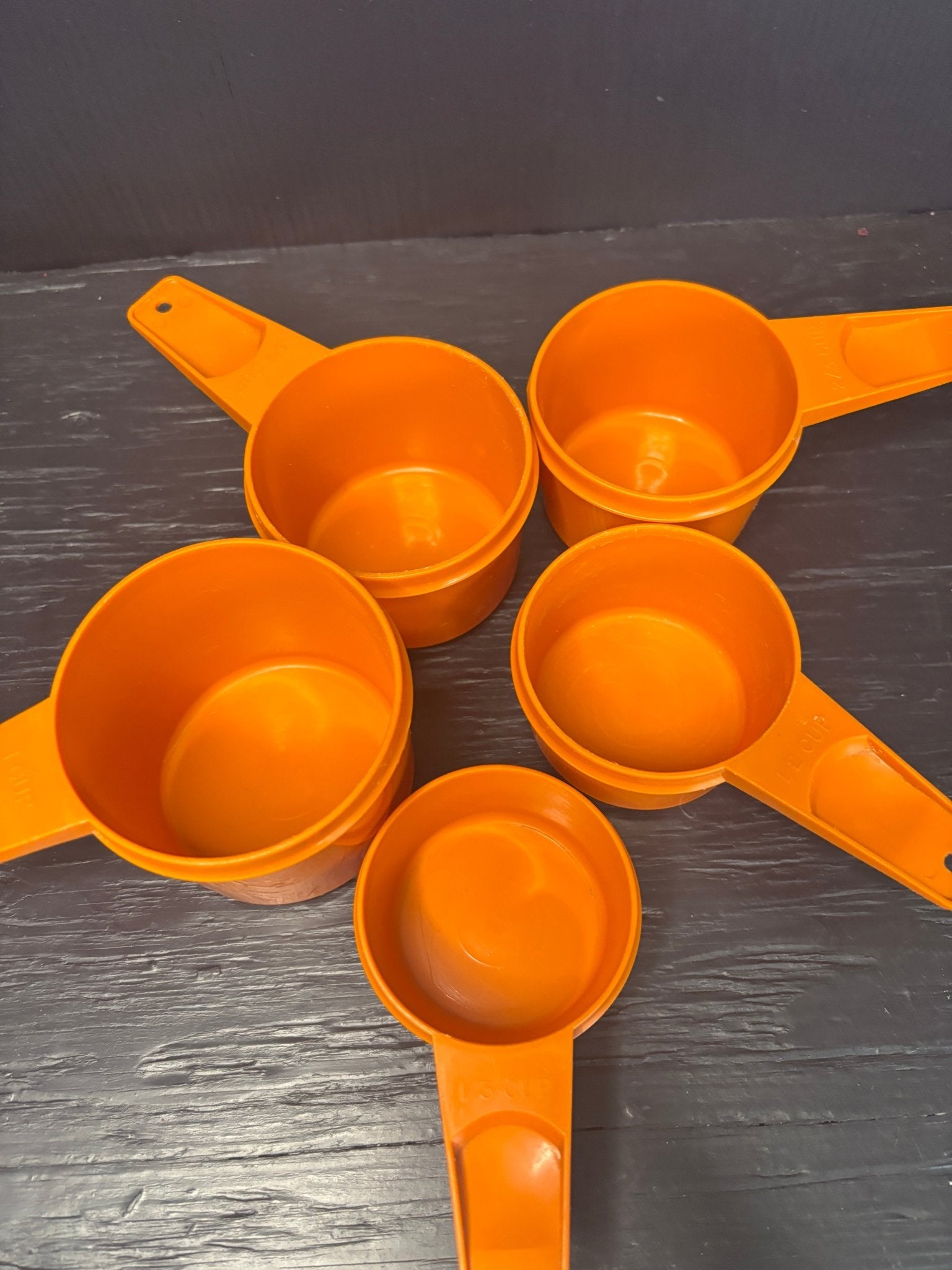 Orange Tupperware Measuring Cups