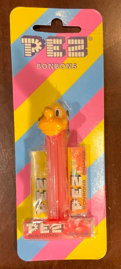 Vintage Pluto Pez Dispenser on striped card new
