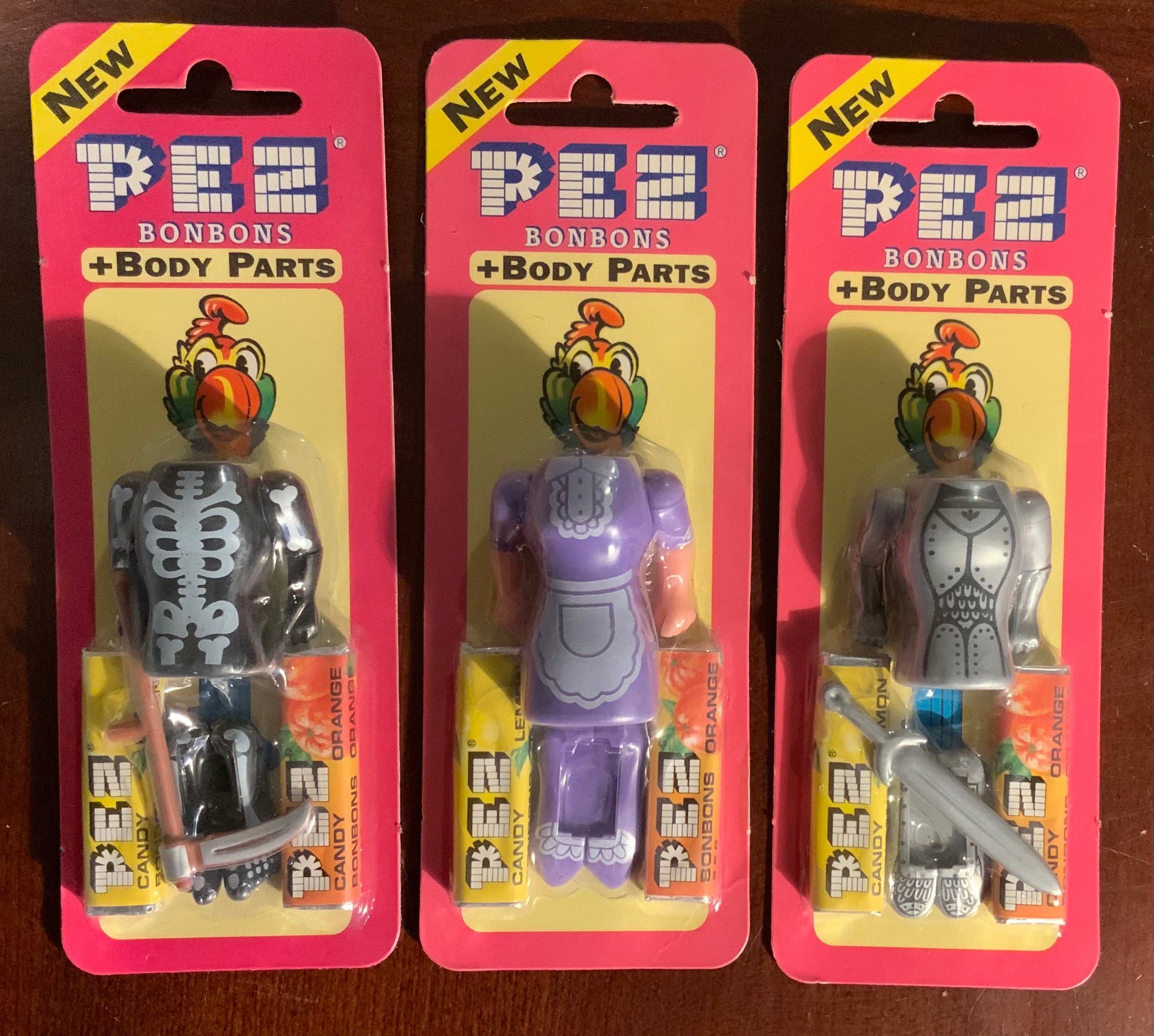 Vintage Pez Body Parts Skeleton Maid Gladiator New on Cards lot of 3